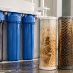 Dirty Filters Beside Water Filtration System
